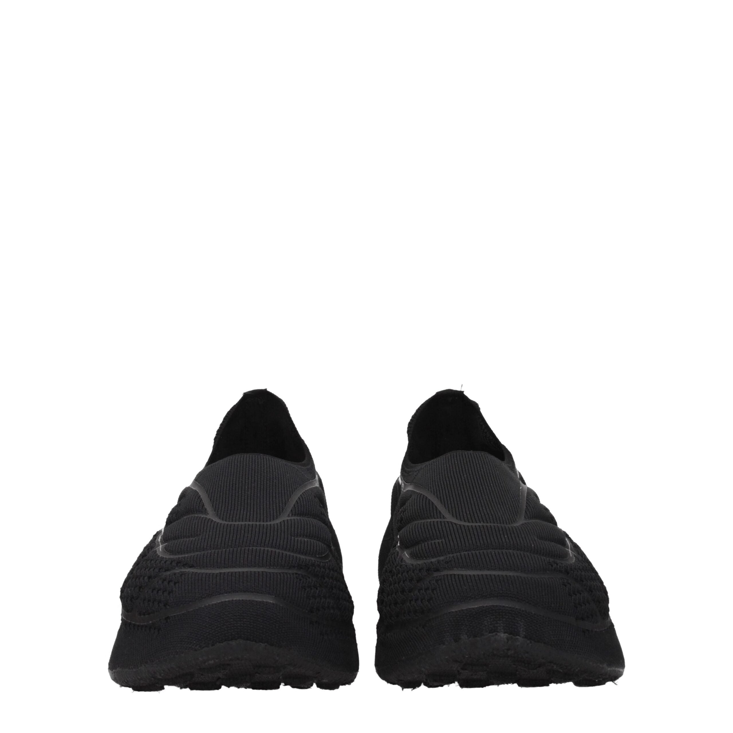 Givenchy Slipper aus schwarzem Stoff